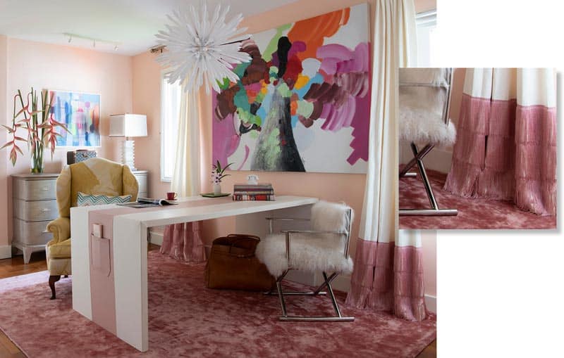 Home office of Nikki Hunt showing artwork and fringed curtains in pink hues