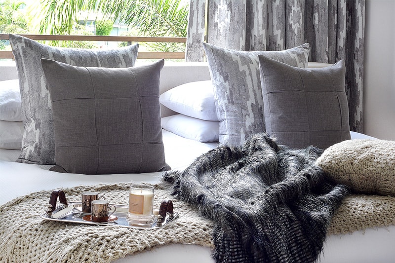 grey tones and texture in a bedroom 